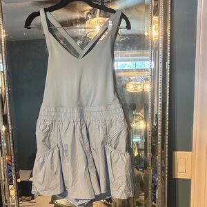 Light Blue Sleeveless Free People Romper with Pockets and built in bra